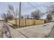 Newly installed wood fence offers privacy and security on this corner lot home in a suburban neighborhood at 2391 Kingston St, Aurora, CO 80010
