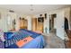 Spacious bedroom with en-suite bathroom access at 11462 Iola St, Commerce City, CO 80640