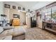Bright and welcoming entryway with built-in bench and storage at 11462 Iola St, Commerce City, CO 80640