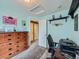 Bright home office with plenty of storage and natural light at 11462 Iola St, Commerce City, CO 80640