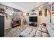 Finished basement recreation room with comfy seating at 11462 Iola St, Commerce City, CO 80640
