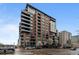 Contemporary multi-story condo building featuring balconies, street views, and urban architecture at 1401 Wewatta St # 311, Denver, CO 80202