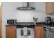 Well-equipped kitchen with stainless steel appliances and sleek granite countertops at 1401 Wewatta St # 311, Denver, CO 80202