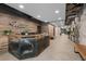 Modern lobby showcasing a stylish front desk, wood accents, and tiled floors at 1401 Wewatta St # 311, Denver, CO 80202