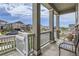 Inviting front porch with bench seating, offering a relaxing outdoor space at 9227 Salida St, Commerce City, CO 80022