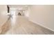 Spacious living room featuring neutral color palette and wood-style flooring at 9227 Salida St, Commerce City, CO 80022