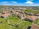 Breathtaking aerial view of the property featuring lush green spaces and nearby shopping centers at 6202 Kilmer Loop # 202, Golden, CO 80403
