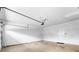Spacious two car garage with ample room for parking and storage and an entry door at 6202 Kilmer Loop # 202, Golden, CO 80403
