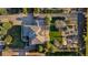 Top down aerial view of a home with a manicured lawn and garden at 5925 Zinnia Ct, Arvada, CO 80004