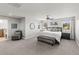 Spacious bedroom with large windows and plush carpeting at 5925 Zinnia Ct, Arvada, CO 80004