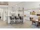 Well-designed kitchen featuring a breakfast bar, ample cabinet space, and modern appliances at 5925 Zinnia Ct, Arvada, CO 80004