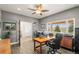 Large home office with wood floors and plenty of natural light at 5925 Zinnia Ct, Arvada, CO 80004