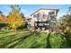 Cozy backyard patio featuring an outdoor seating area, perfect for relaxing and entertaining at 1931 Foothills Rd, Golden, CO 80401