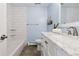 Updated bathroom with a tub, white subway tile, and marble vanity at 1931 Foothills Rd, Golden, CO 80401