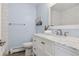 Updated bathroom featuring a modern vanity with a white marble countertop at 1931 Foothills Rd, Golden, CO 80401