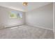 Bedroom featuring carpet, radiator and a window with green views at 1931 Foothills Rd, Golden, CO 80401