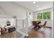 Bright dining area featuring modern table and chairs, natural light, and easy access to the living area at 1931 Foothills Rd, Golden, CO 80401