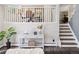 Welcoming entryway with modern decor, stylish console table, and easy access to the stairway at 1931 Foothills Rd, Golden, CO 80401