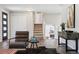 Inviting living area showcasing hardwood floors, a cozy fireplace, and modern decor at 1931 Foothills Rd, Golden, CO 80401