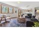 Spacious living room with comfortable seating, hardwood floors, and lots of natural light at 1931 Foothills Rd, Golden, CO 80401
