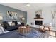 Cozy living room with a white brick fireplace and stylish decor at 1931 Foothills Rd, Golden, CO 80401