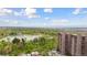 Aerial view of a residential community offering lake and city views at 480 S Marion Pkwy # 802, Denver, CO 80209