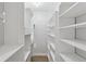 Walk-in closet offering custom shelving and ample storage space at 480 S Marion Pkwy # 802, Denver, CO 80209