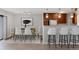 Bright dining room area featuring a modern light fixture and a view of the balcony at 480 S Marion Pkwy # 802, Denver, CO 80209