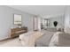 A serene main bedroom featuring a bed, nightstands, and dresser at 480 S Marion Pkwy # 802, Denver, CO 80209