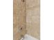Tiled shower featuring updated shower head and fixtures, as well as built-in corner shelving at 480 S Marion Pkwy # 802, Denver, CO 80209