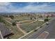 Aerial view showcasing the community park, playgrounds, and the surrounding neighborhood at 19681 E 59Th Pl, Aurora, CO 80019