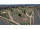 Aerial view of the community park with walking paths, picnic tables, and green spaces at 19681 E 59Th Pl, Aurora, CO 80019