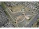 Community park showcasing fields, green spaces, a playground, and walking paths at 19681 E 59Th Pl, Aurora, CO 80019