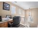 Upstairs office space with natural light and desk area, great for working from home at 19681 E 59Th Pl, Aurora, CO 80019
