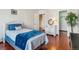 Bedroom with hardwood flooring and serene atmosphere at 3465 S Poplar St # 506, Denver, CO 80224
