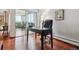 This office has a large sliding glass door to the outdoor balcony at 3465 S Poplar St # 506, Denver, CO 80224