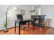 The home office features a stately desk and a striking decorative fireplace at 3465 S Poplar St # 506, Denver, CO 80224