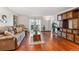 Spacious living room with hardwood floors and bright light at 3465 S Poplar St # 506, Denver, CO 80224