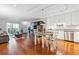 Bright living room featuring hardwood floors and combined living/dining and kitchen at 3465 S Poplar St # 506, Denver, CO 80224