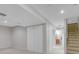 Basement has large closet and access to additional rooms via doorways at 4112 Brandon Ave, Broomfield, CO 80020