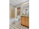 Bathroom features a tub/shower combination, a toilet, and a vanity at 4112 Brandon Ave, Broomfield, CO 80020