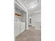 Laundry room with washer, dryer, shelving and storage space at 4112 Brandon Ave, Broomfield, CO 80020