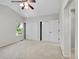 Bright bedroom with tall ceilings, large closet and a bright window with a pleasant neighborhood view at 1288 S Beeler Ct, Denver, CO 80247