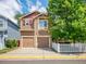 Charming two-story home with a two-car garage and well-manicured landscaping, exuding curb appeal at 1288 S Beeler Ct, Denver, CO 80247