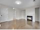 Living room featuring a fireplace, hardwood flooring, and neutral wall colors at 1288 S Beeler Ct, Denver, CO 80247