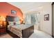 Cozy bedroom with a vaulted ceiling, large window and patterned bedding at 3260 47Th St # 205A, Boulder, CO 80301