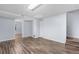 Spacious basement with wood floors, neutral walls, and an open layout at 19410 E Ithaca Pl, Aurora, CO 80013