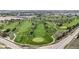 Lush green golf course with manicured fairways and greens, providing a recreational amenity for golf enthusiasts at 13488 Wabash St, Thornton, CO 80602