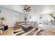 A lovely, well-lit living room with nice furniture at 13488 Wabash St, Thornton, CO 80602