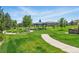 Community park with a gazebo surrounded by walking paths at 6292 Kilmer Loop # 201, Golden, CO 80403